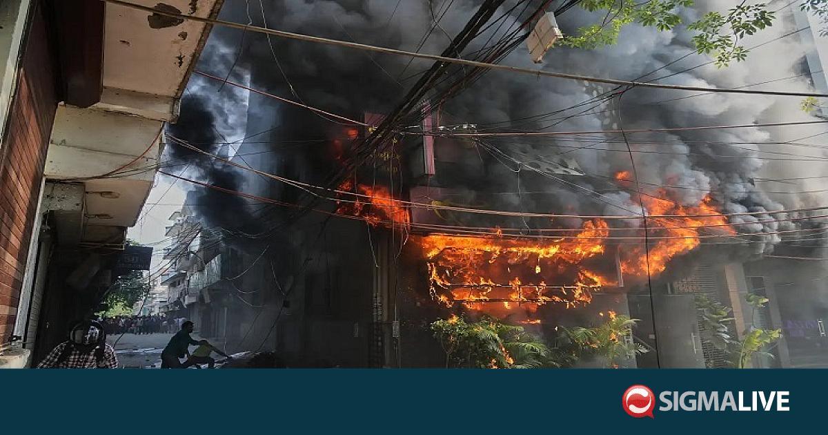 &Sigma;&tau;&iota;&sigmaf; &phi;&lambda;ό&gamma;&epsilon;&sigmaf; &kappa;&tau;ί&rho;&iota;&omicron; &sigma;&tau;&omicron; &Nu;έ&omicron; &Delta;&epsilon;&lambda;&chi;ί: 20 &nu;&epsilon;&kappa;&rho;&omicron;ί &kappa;&alpha;&iota; &delta;&epsilon;&kappa;ά&delta;&epsilon;&sigmaf; &tau;&rho;&alpha;&upsilon;&mu;&alpha;&tau;ί&epsilon;&sigmaf;